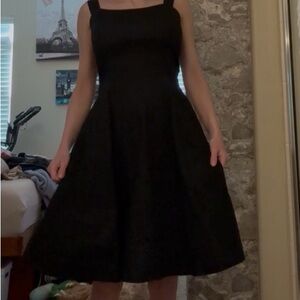 Ruby Rox Classic Black Midi Dress with pink tulle underneath